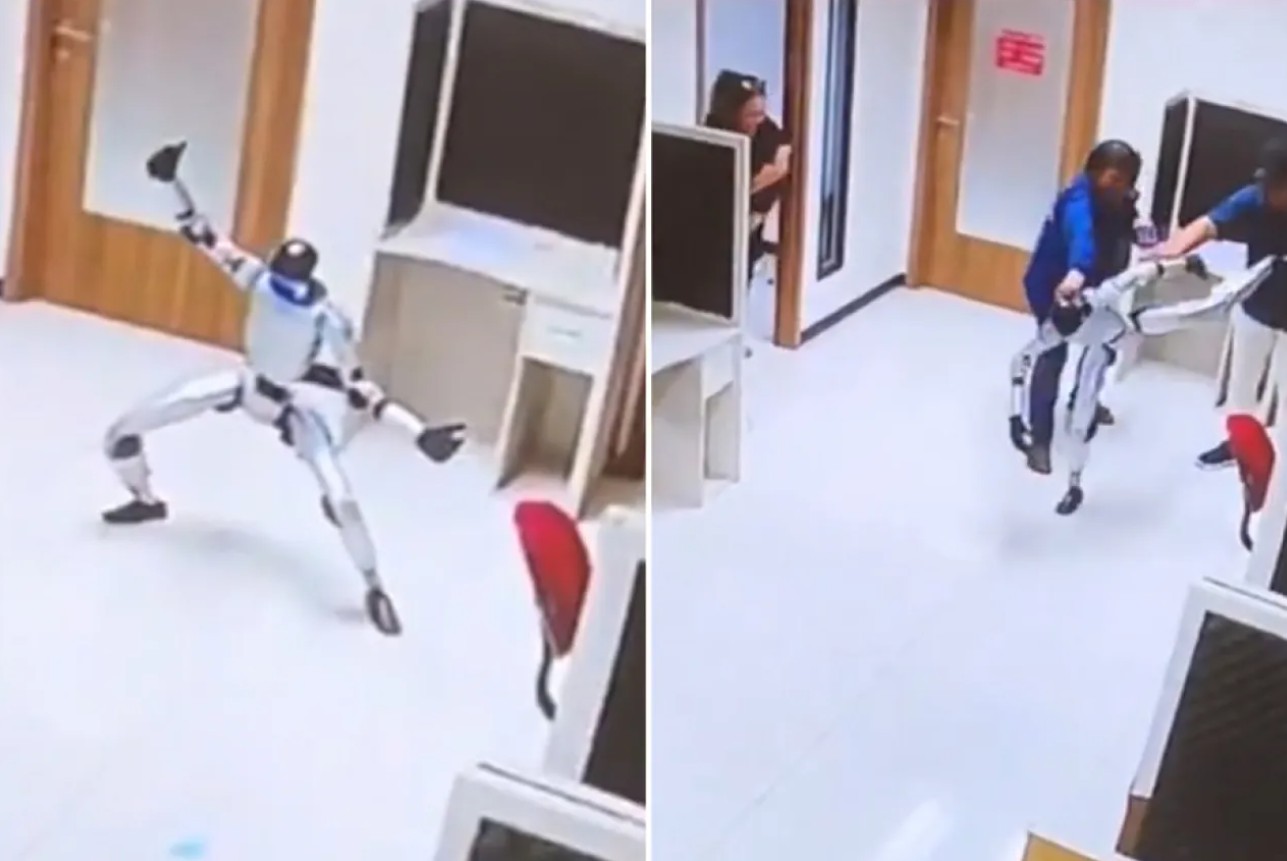 Robot humanoide causa sensación al simular una p3lea en una oficina 96