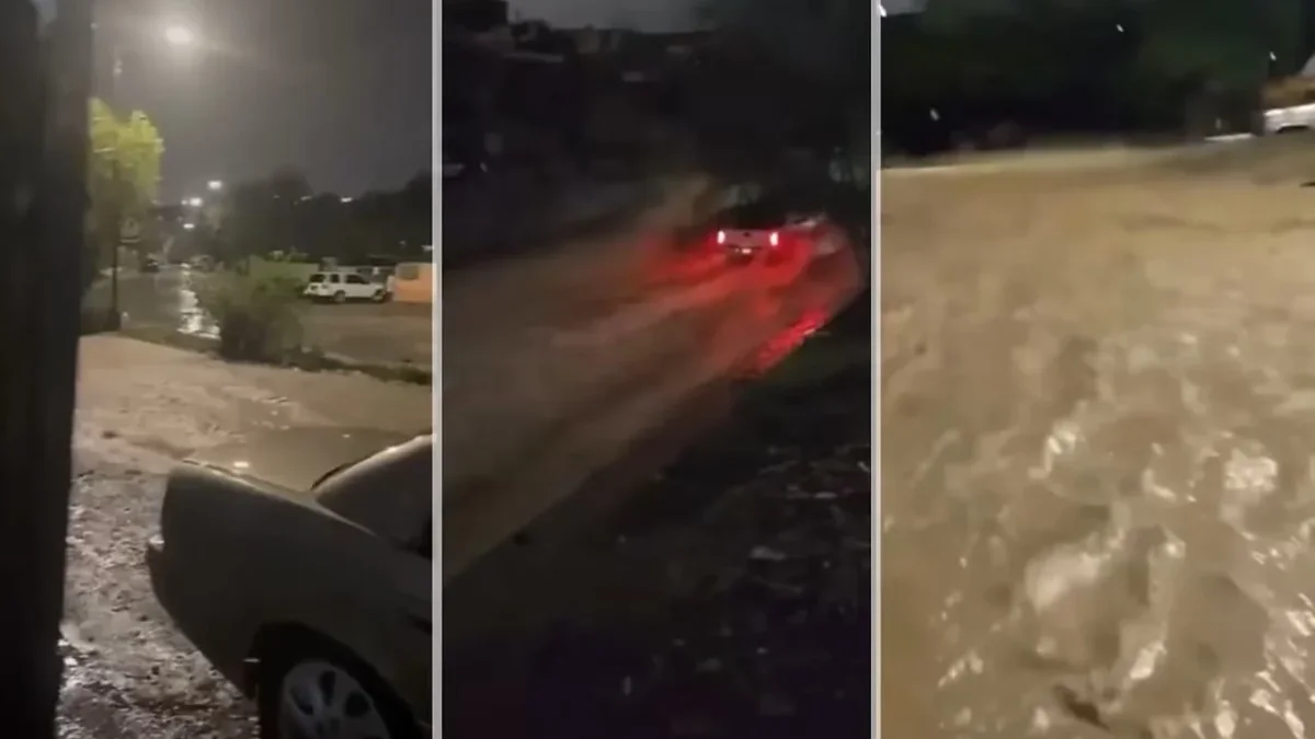 Fuerte corriente de agua en una vialidad de la colonia Ricardo Flores Magón en Ciudad Juárez