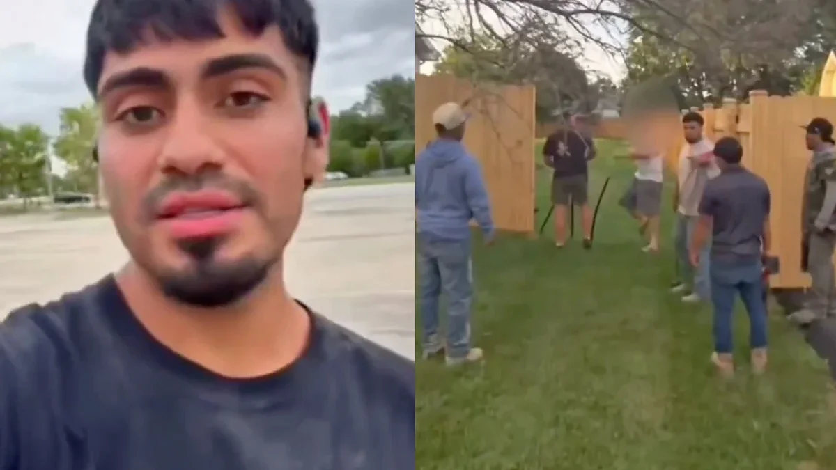 Trabajadores desmontan una cerca de madera en una vivienda de Joliet Illinois