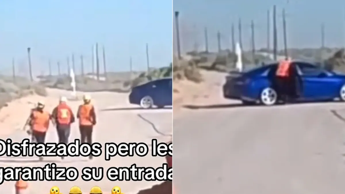 Personas con chalecos y cascos durante presunto cruce junto al muro fronterizo