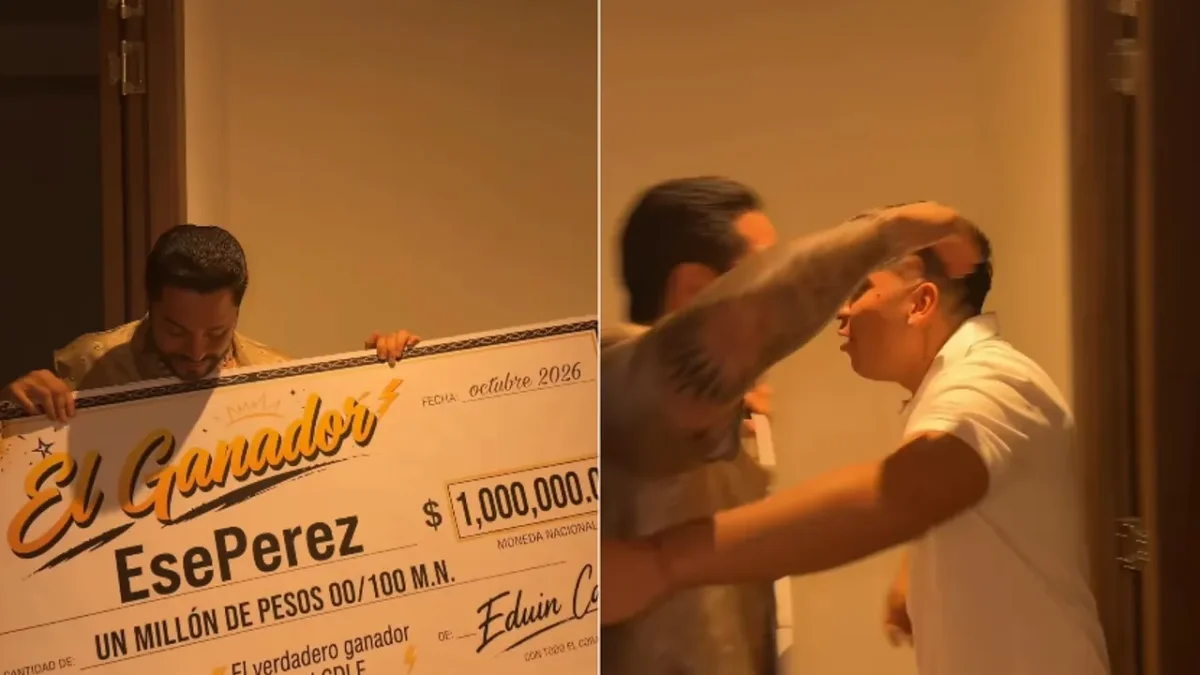 Eduin Caz entrega un cheque de un millón de pesos a Ese Pérez