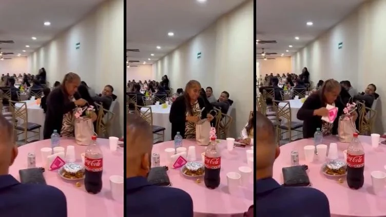 Mujer guarda un servilletero y adornos de una fiesta en su bolsa