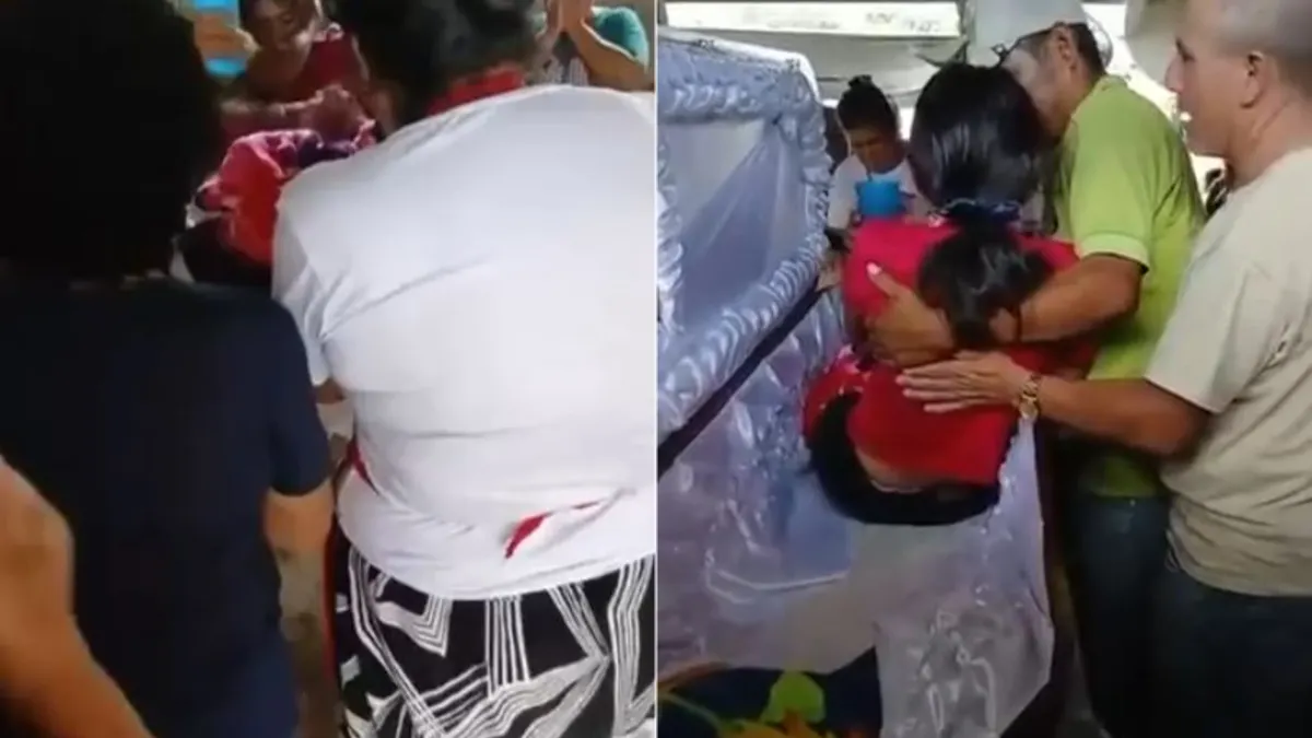 Joven sentada dentro de un ataúd durante un velorio en Guatemala