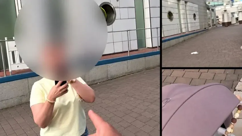 Padre cambia el pañal de su hija mientras una mujer lo cuestiona en público
