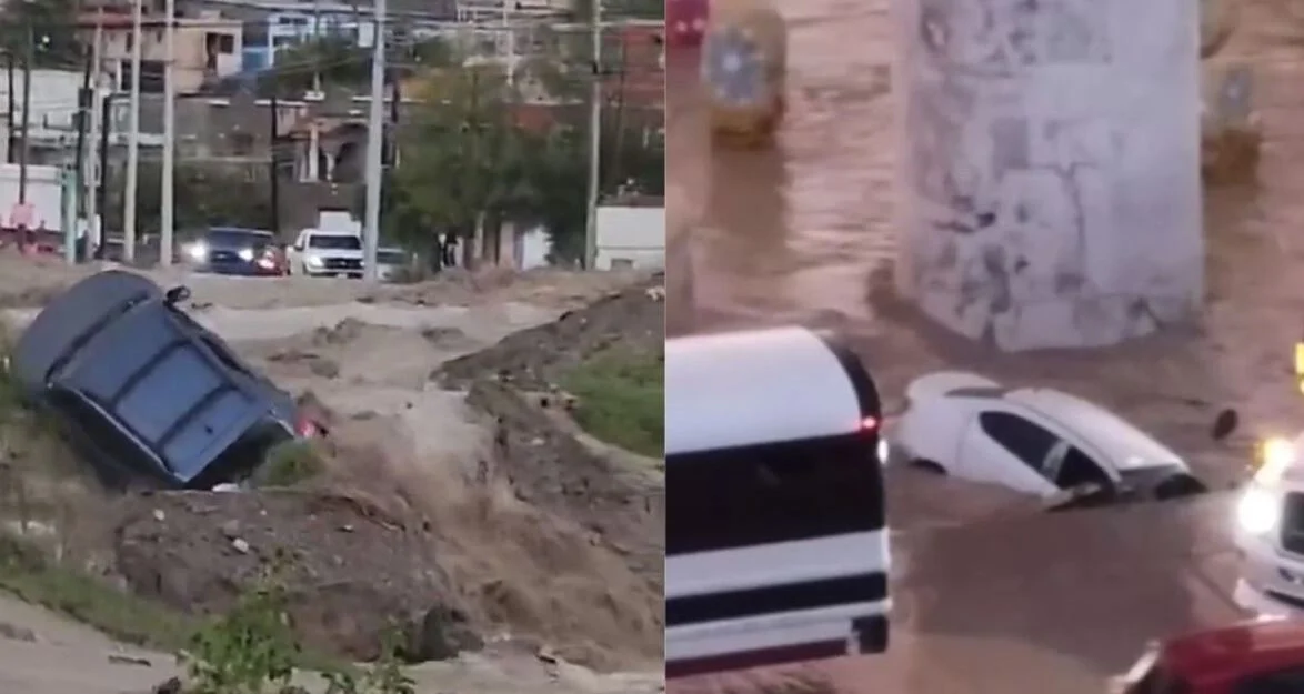 Nubes de tormenta y acumulación de agua en una vialidad de Ciudad Juárez
